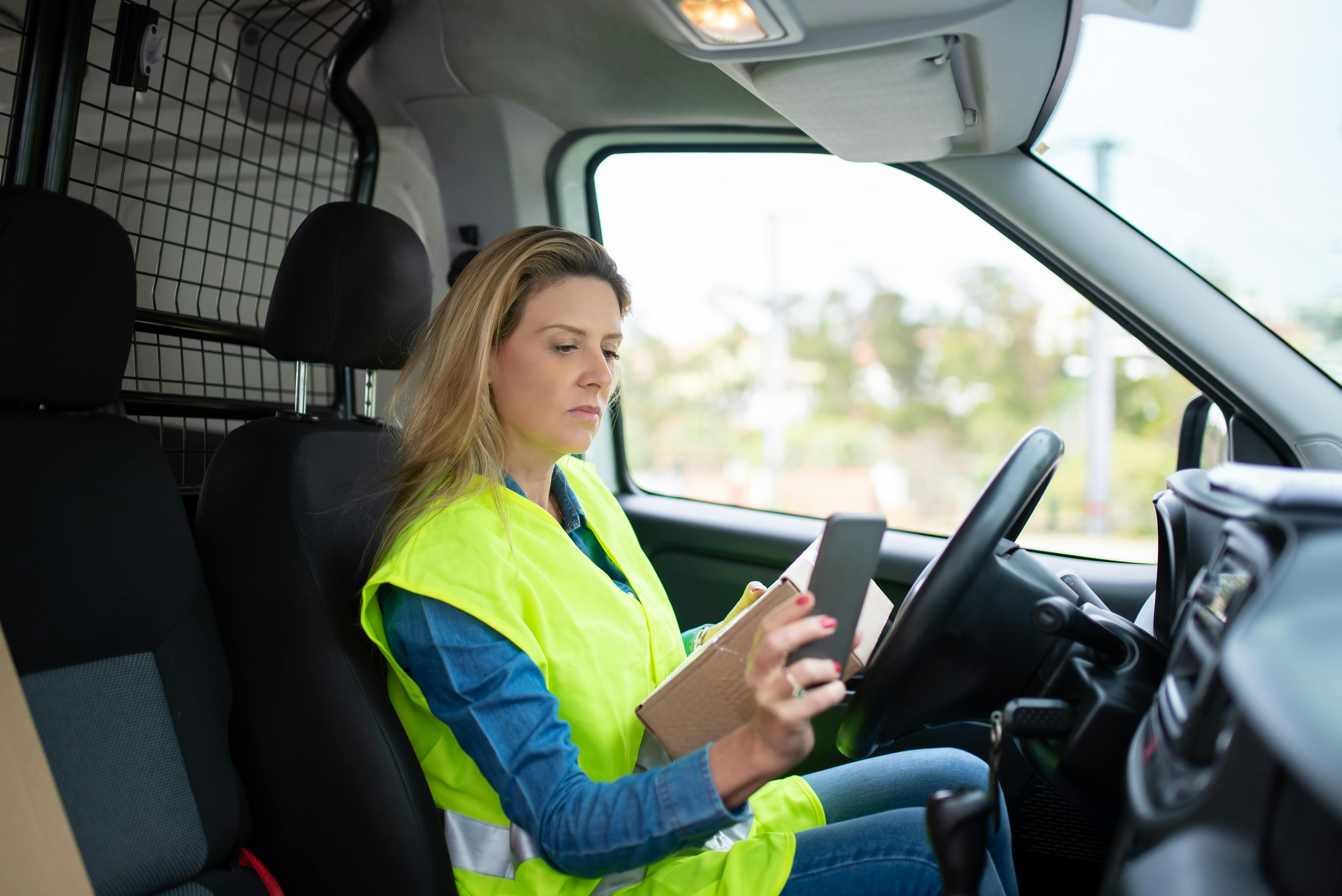 Driver in the field completing a delivery